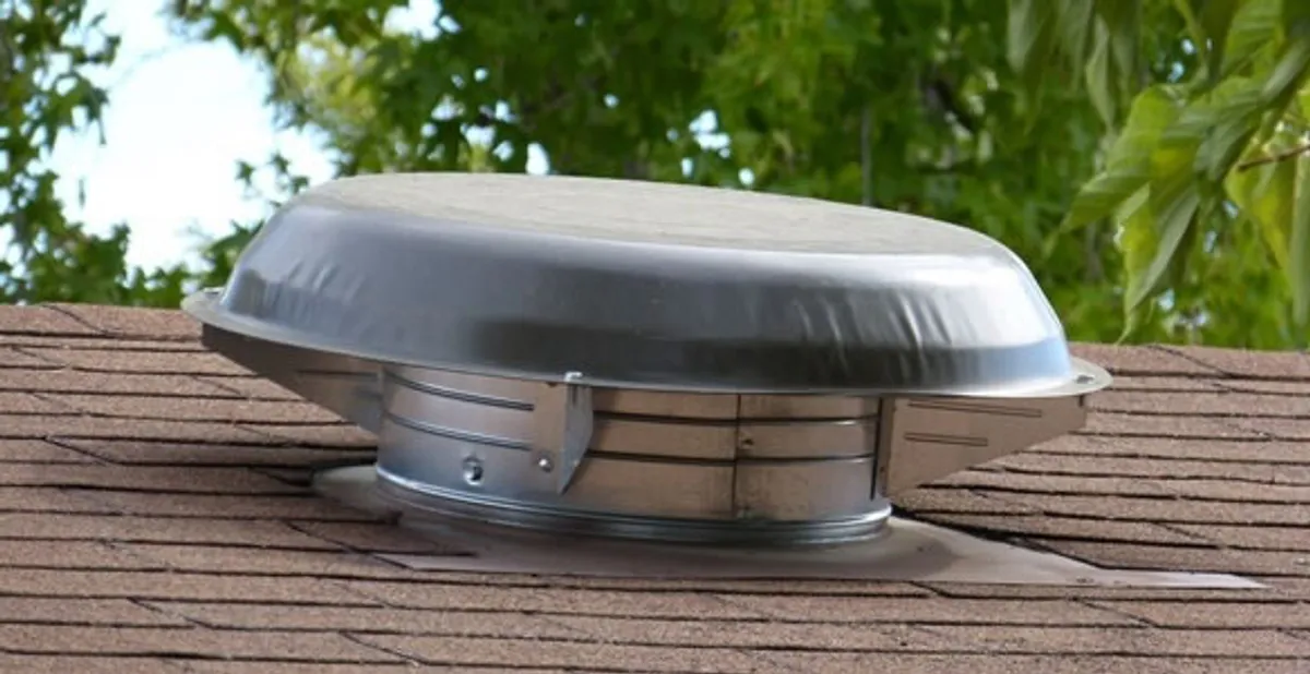 attic fan installation services with low-profile roof ventilation unit in Orange, CA