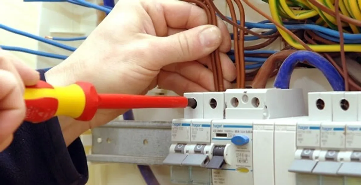 electrician services performing professional electrical panel wiring and connections in Orange, CA